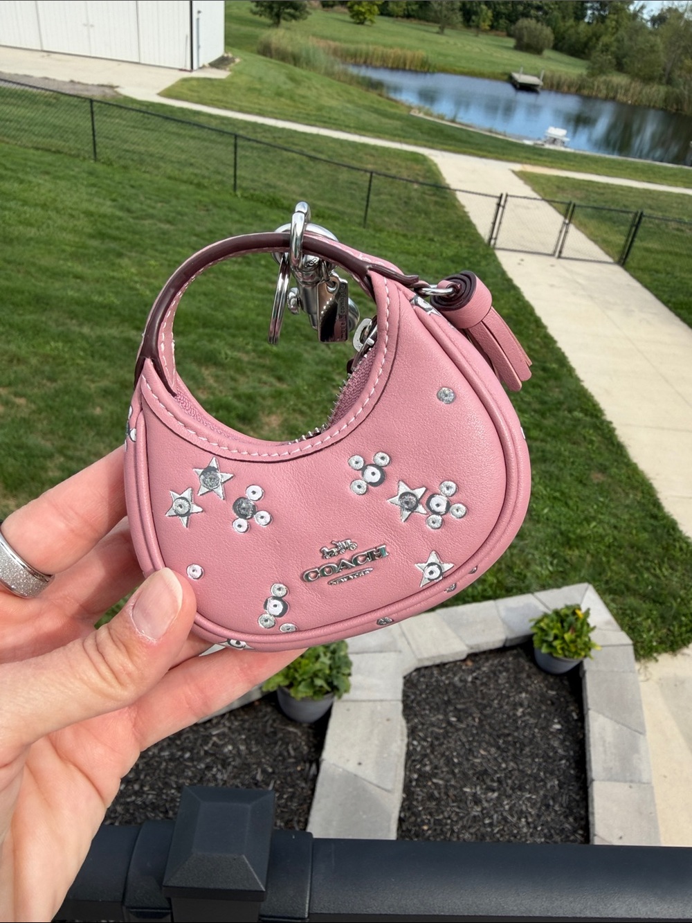 Coach Pink Star-Studded Mini Wristlet Keychain